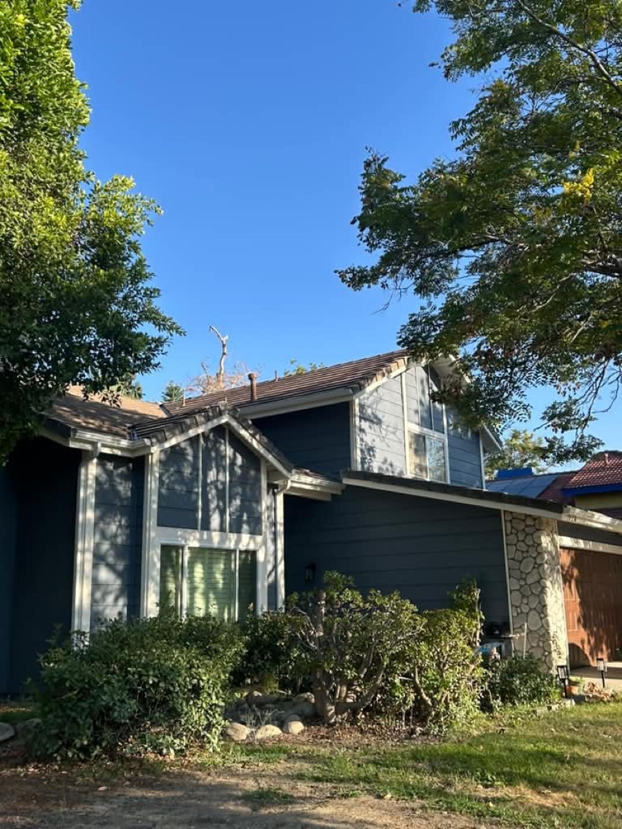Before: Two-story home — full gutter system (front before, back after)