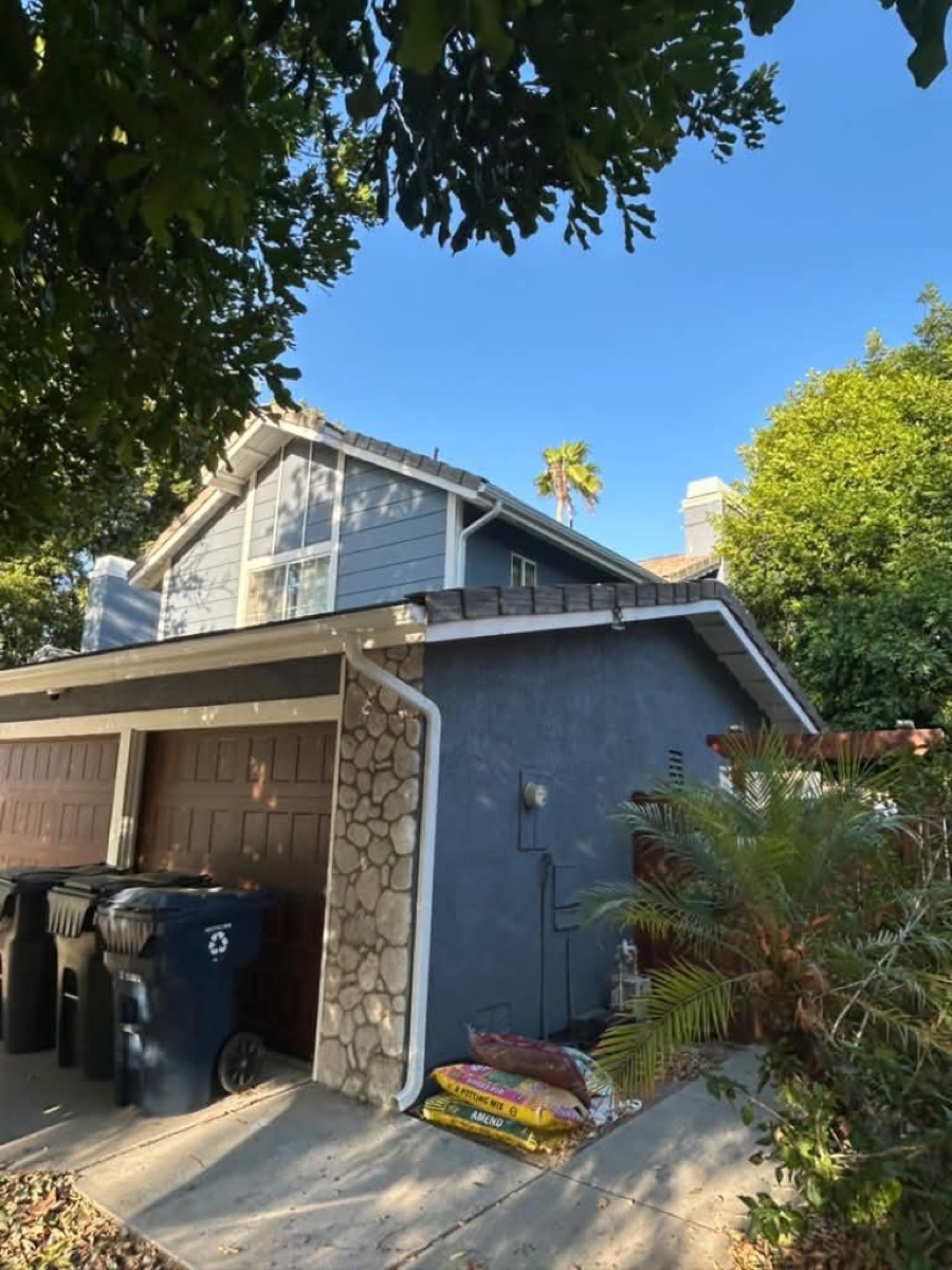 After: Two-story home — garage gutters & downspout