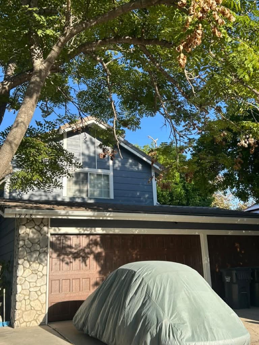 Before: Two-story home — garage gutters & downspout